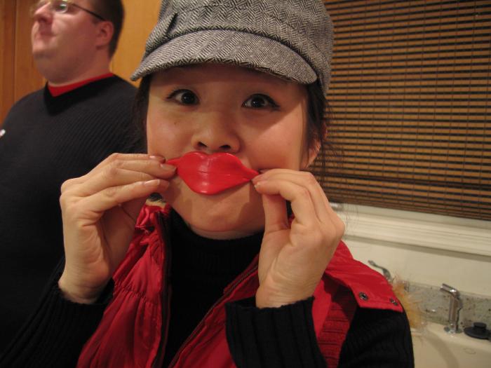 Cindy hamming it up for the camera in lips she made from silly putty.